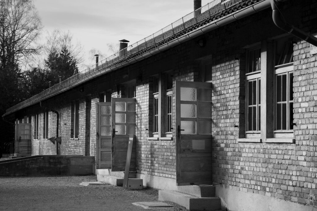 Black and white photo of a historic brick building in Dachau, Bavaria.